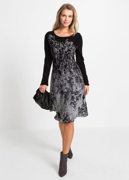 Sukienka dzianinowa. Czarne sukienki damskie bonprix, bez wzorów, z dzianiny, eleganckie, bez kołnierzyka, bez ramiączek. Za 169.99 zł.