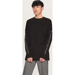 Bluza z nadrukiem - Czarny. Czarne bluzy dla chłopców Reserved, z nadrukiem. Za 49.99 zł.