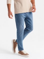 Męskie jeansowe spodnie CARROT FIT z delikatnymi przetarciami niebieskie V1 OM-PADP-0162 XL. Niebieskie spodnie sportowe męskie Ombre, m, bez wzorów, z jeansu. Za 302.57 zł.