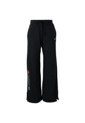 Spodnie damskie Nike Sportswear czarny. Czarne spodnie materiałowe damskie Nike, l, bez wzorów, z materiału, trekkingowe. Za 470.80 zł.