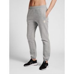 Damskie spodnie dresowe Hummel GG 12. Szare spodnie dresowe damskie Hummel, s, bez wzorów, z bawełny. Za 149.50 zł.