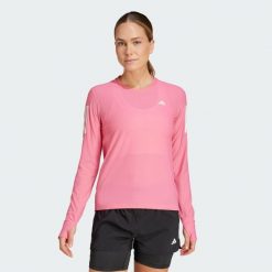 Koszulka Own The Run Long Sleeve. Czerwone koszulki sportowe damskie Adidas, s, bez wzorów, z materiału, sportowe, bez kołnierzyka. Za 189.05 zł.