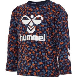 Koszulka z długim rękawem dla dziewczynki Hummel Confetti. Niebieskie t-shirty i topy dla dziewczynek Hummel, bez wzorów, z bawełny, bez ramiączek. Za 168.00 zł.