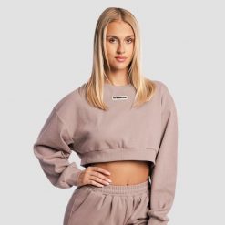 Bluza damska krótka bez kaptura rdzawa Aura. Brązowe bluzy damskie GYMBEAM, m, bez wzorów, z bawełny, bez kaptura, na fitness i siłownię. Za 118.90 zł.