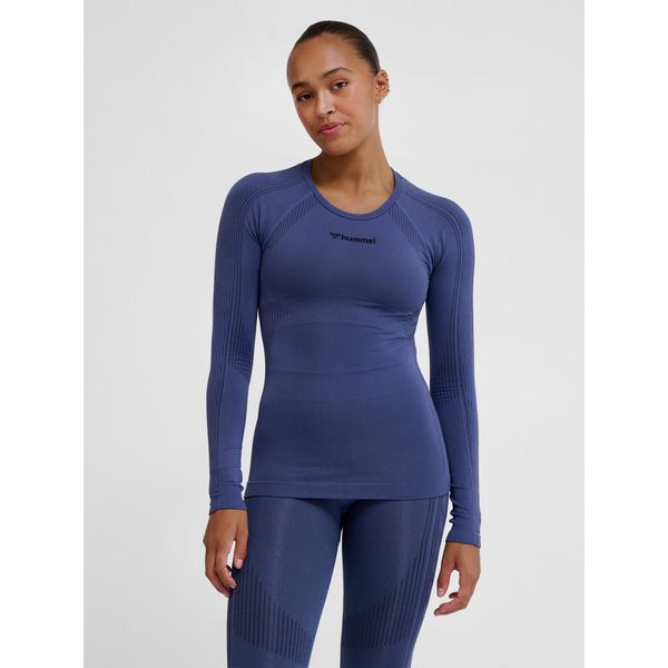 Damska koszulka bezszwowa z długim rękawem Hummel Shaping. Niebieskie koszulki sportowe damskie Hummel, bez wzorów, bez kołnierzyka, bez ramiączek, na fitness i siłownię. Za 135.00 zł.