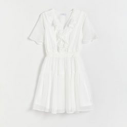 Sukienka z lyocellem - biały. Białe sukienki damskie Reserved, l, bez wzorów, z lyocellu, bez kołnierzyka, bez ramiączek, mini. W wyprzedaży za 59.99 zł.