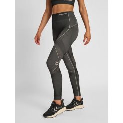 Damskie legginsy mid-rise Hummel MT Mila. Brązowe legginsy damskie Hummel, xs, bez wzorów, z dzianiny, na fitness i siłownię. Za 205.35 zł.