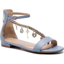 Sandały GUESS - Radhika FL6RAD LEA03 BLUE. Niebieskie klapki damskie Guess, z aplikacjami, ze skóry, bez obcasa, na obcasie, bez zapięcia. W wyprzedaży za 449.00 zł.