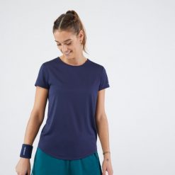 Koszulka do tenisa z okrągłym dekoltem damska Artengo Dry Essential 100. Niebieskie koszulki sportowe damskie ARTENGO, l, bez wzorów, z materiału, eleganckie, bez kołnierzyka. Za 39.99 zł.