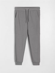 Spodnie jogger dresowe pique - szary. Szare spodnie sportowe męskie Sinsay, l, bez wzorów, z dresówki. W wyprzedaży za 25.99 zł.