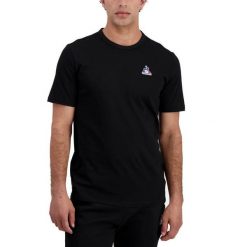Koszulka Le Coq Sportif Essentiels. Czarne koszulki sportowe męskie le coq sportif, m, z aplikacjami, z bawełny, bez kołnierzyka, bez ramiączek, na fitness i siłownię. Za 129.10 zł.