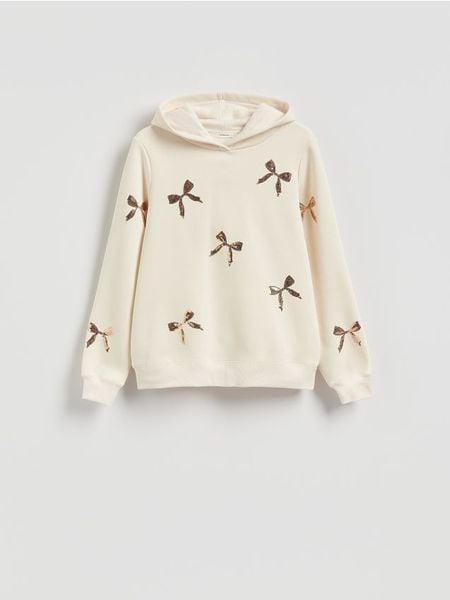 Bluza ze świątecznym motywem - złamana biel. Bluzy damskie Reserved, l, bez wzorów, z bawełny, bez kaptura. Za 99.99 zł.