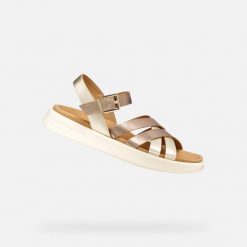 Sandały GEOX D XAND 2S Złoty. Żółte sandały damskie Geox, bez wzorów, ze skóry, bez obcasa, bez zapięcia. Za 423.99 zł.
