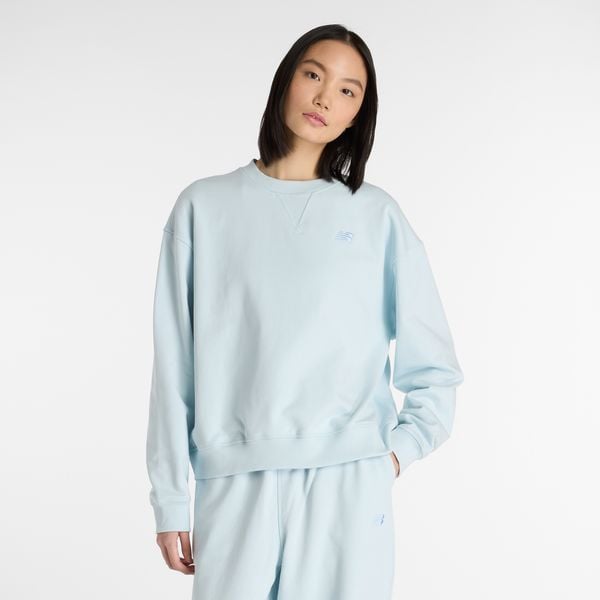 Bluza damska New Balance WT41500FRL – niebieska. Niebieskie bluzy damskie New Balance, s, bez wzorów, z bawełny, bez kaptura. Za 359.99 zł.
