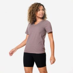 Koszulka z krótkim rękawem damska Domyos Gym & Pilates. Brązowe koszulki sportowe damskie NYAMBA, m, bez wzorów, z bawełny, bez kołnierzyka, bez ramiączek, na jogę i pilates. Za 39.99 zł.
