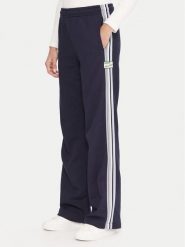 Lacoste Spodnie dresowe XF5250 Granatowy Regular Fit. Niebieskie spodnie dresowe damskie Lacoste, bez wzorów, z bawełny. Za 739.99 zł.