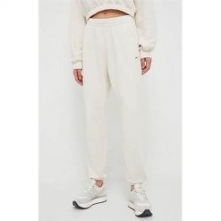 Spodnie sportowe damskie Reebok HS0373. Białe spodnie dresowe damskie Reebok, s, z aplikacjami, z bawełny. Za 159.99 zł.