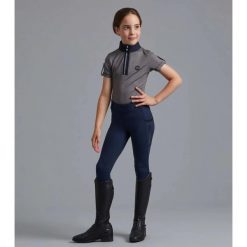 Dziewczęce legginsy jeździeckie z pełną przyczepnością Premier Equine Concerto. Niebieskie legginsy dla dziewczynek PREMIER EQUINE, bez wzorów, z materiału. Za 350.00 zł.