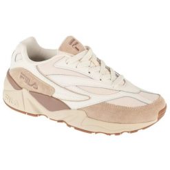 Buty Fila V94M FFW0397-13121 damskie sportowe beżowe beżowy. Brązowe obuwie sportowe damskie bez wzorów, z gumy. Za 452.98 zł.