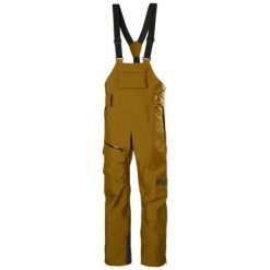 Damskie spodnie narciarskie na szelkach Helly Hansen Powderqueen. Brązowe spodnie materiałowe damskie Helly Hansen, bez wzorów. Za 1,338.00 zł.