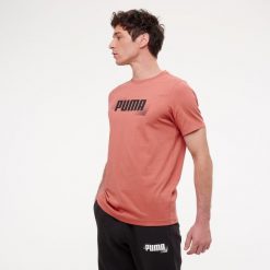 Koszulka z krótkim rękawem męska Puma Gym & Pilates. Czerwone koszulki sportowe męskie Decathlon, m, bez wzorów, z bawełny, bez kołnierzyka, bez ramiączek, na fitness i siłownię. Za 59.99 zł.