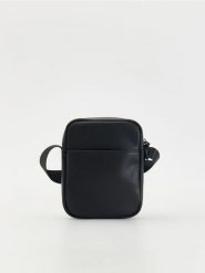 Saszetka crossbody - czarny. Czarne saszetki męskie Reserved, ze skóry, małe. W wyprzedaży za 65.99 zł.