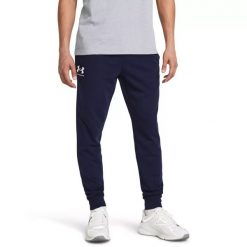 Under Armour UA RIVAL TERRY JOGGER Spodnie dresowe męskie. Niebieskie spodnie sportowe męskie Under Armour, l, bez wzorów, z dresówki, na fitness i siłownię. Za 154.99 zł.