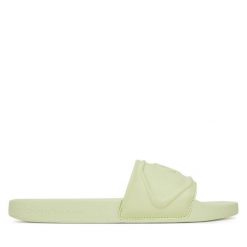 Klapki Calvin Klein Jeans. Zielone klapki damskie Calvin Klein Jeans, bez wzorów, z jeansu, bez obcasa. Za 139.99 zł.
