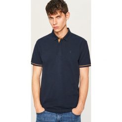 Koszulka polo - Granatowy. Niebieskie koszulki polo męskie Reserved. Za 79.99 zł.