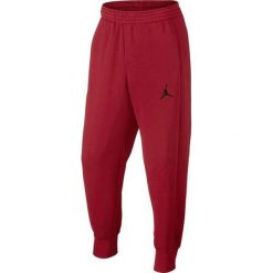 Jordan Spodnie męskie Flight Pant czerwone r. XL (823071-687). Spodnie sportowe męskie marki Jordan. Za 453.94 zł.