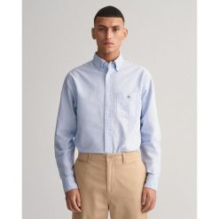 Koszula Gant Classic Oxford. Niebieskie koszule męskie GANT, m, bez wzorów, z tkaniny, biznesowe, bez kołnierzyka, bez ramiączek. Za 483.90 zł.