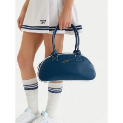 Torebka Reebok. Niebieskie torebki do ręki damskie Reebok, bez wzorów, klasyczne, bez dodatków. Za 199.99 zł.