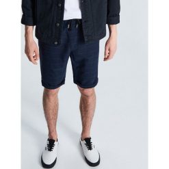 Szorty jogger w kratkę - Granatowy. Niebieskie szorty męskie marki Cropp, bez wzorów. Za 79.99 zł.