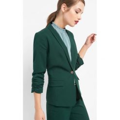 Taliowany żakiet. Zielone żakiety damskie Orsay, z elastanu. Za 169.99 zł.