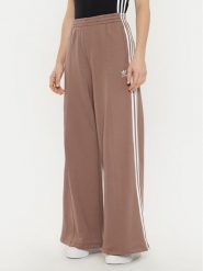 Adidas Spodnie dresowe 3-Stripes JC5762 Beżowy Wide Leg. Brązowe spodnie dresowe damskie Adidas, l, bez wzorów, z bawełny. Za 199.99 zł.