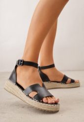 Czarne Sandały VICES na Platformie z Plecionką i Wycięciami Helimis. Czarne sandały damskie Renee, bez wzorów, z koronki, bez obcasa, na platformie, bez zapięcia. Za 99.99 zł.