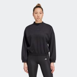 Bluza fitness damska ADIDAS crop top. Czarne bluzy sportowe damskie Adidas, xl, bez wzorów, z materiału, bez kaptura, na fitness i siłownię. Za 249.99 zł.