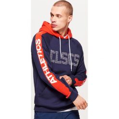Bluza z kapturem CLASSIC - Granatowy. Bluzy męskie marki KALENJI. W wyprzedaży za 49.99 zł.