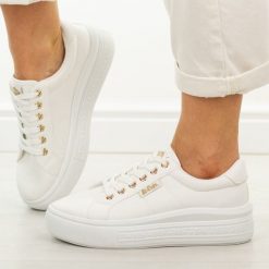 Białe trampki damskie Lee Cooper 4474. Białe trampki i tenisówki damskie Lee Cooper, bez wzorów, z gumy, casualowe, bez zapięcia. Za 139.00 zł.