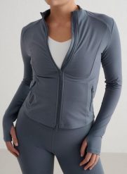 Damska kurtka jedwabista, second skin, dwusuwowy zamek Sense burzowy błękit. Niebieskie kurtki damskie Aim'n, l, bez wzorów, z elastanu, bez kaptura, na jogę i pilates. Za 339.00 zł.