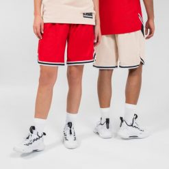Dwustronne spodenki do koszykówki Tarmak SH500. Czerwone krótkie spodenki sportowe męskie TARMAK, xl, bez wzorów, z materiału, do koszykówki. W wyprzedaży za 79.99 zł.