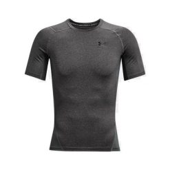 Jersey Under Armour à manches courtes. Czarne koszulki sportowe męskie Under Armour, l, bez wzorów, z jersey, bez kołnierzyka, bez ramiączek, na fitness i siłownię. Za 204.50 zł.