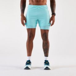 Spodenki do biegania męskie Kiprun 2w1 Run 500 Comfort. Niebieskie krótkie spodenki sportowe męskie KIPRUN, l, bez wzorów, z materiału, do biegania. Za 129.99 zł.