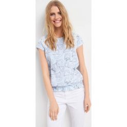 Bombkowa koszulka z ażurem. T-shirty damskie marki Orsay. Za 39.99 zł.