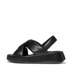 Sandały damskie FitFlop F-Mode Knot Soft-Leather Flatform B/Strap. Czarne sandały damskie Flip Flop, bez wzorów, z materiału, bez obcasa, na płaskiej podeszwie, bez zapięcia. Za 577.65 zł.