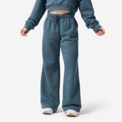 Spodnie dresowe damskie Domyos. Niebieskie spodnie dresowe damskie DOMYOS, l, bez wzorów, z bawełny, na fitness i siłownię. Za 149.99 zł.