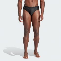 Szorty Lineage Swim. Czarne krótkie spodenki sportowe męskie Adidas, l, bez wzorów, z elastanu, do pływania. Za 119.00 zł.
