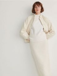 Dzianinowa spódnica midi - złamana biel. Spódnice damskie Reserved, l, bez wzorów, z dzianiny, midi, dopasowane. W wyprzedaży za 35.99 zł.