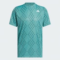 Koszulka z grafiką Club Tennis Climacool. Niebieskie koszulki sportowe męskie Adidas, bez wzorów, bez kołnierzyka, bez ramiączek, tenisowe, climacool (adidas). Za 199.00 zł.