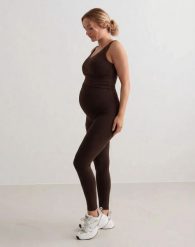 Damskie legginsy ciążowe, z wysokim stanem, squat proof Sense czekoladowe. Brązowe legginsy damskie Aim'n, m, bez wzorów, z elastanu, z podwyższonym stanem, długie, na fitness i siłownię. Za 301.00 zł.